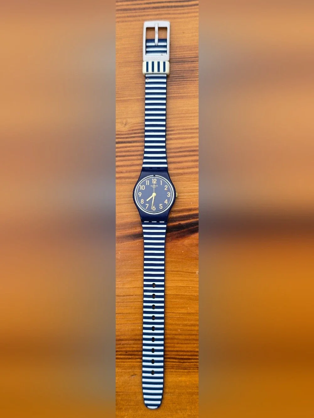 Swatch Ora D'Aria Navy and White Striped Silicone Watch with Gold Accents
